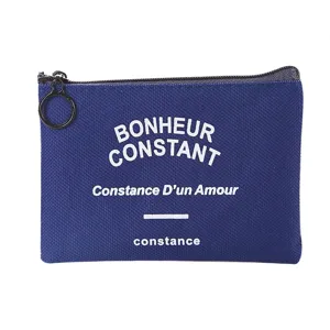 Blue canvas coin purse with zipper closure and stylish white letter print for daily use.