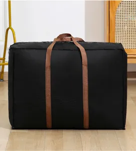 Vista dettagliata della borsa portaoggetti nera di grande capacita, ideale per vestiti e coperte.