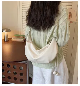 Korean style minimalist shoulder crossbody dumpling bag for women, soft leather casual purse.