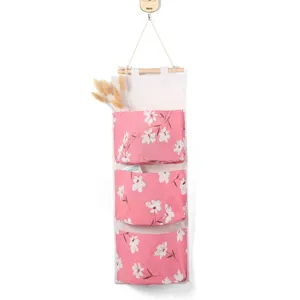 Bolsa de almacenamiento colgante de algodón y lino organizador de pared con 3 bolsillos vista principal