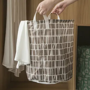 Grote opvouwbare katoenen linnen mand voor kleding opbergen met dubbele handvatten hoofdfoto