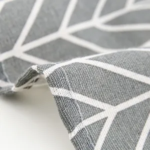 Gray and white geometric leaf pattern cotton linen fabric texture close up view for home decor