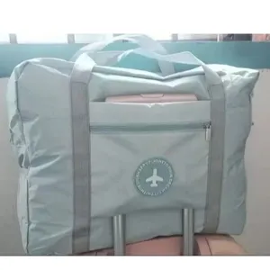 Large capacity foldable travel bag with luggage sleeve, durable fabric, convenient for daily trips.