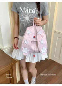Joli sac à dos rose avec oreilles de lapin et patchs d'étoiles, grand sac d'école décontracté pour femmes.