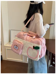 Casual large capacity travel duffel bag detail, lightweight pink crossbody sports fitness bag.