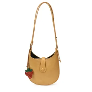 Trendy women's shoulder crossbody bag with cute strawberry charm and chic half-moon design.