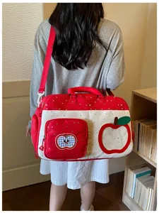 Casual large capacity travel duffel bag with cute apple pattern and star print for weekend trips.