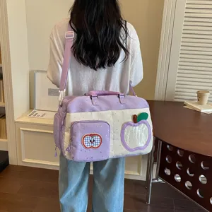 Casual large capacity travel duffel bag with cute apple patch for short trips and fitness.