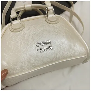 Koreaanse stijl chic klein ontwerp bowling handtas, zomer nieuwe retro casual crossbody tas.
