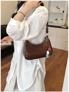 Chic brown croc-embossed underarm shoulder bag for women, trendy minimalist daily purse.