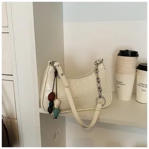 Trendy off-white crocodile texture underarm shoulder bag with chain link and bead charm.