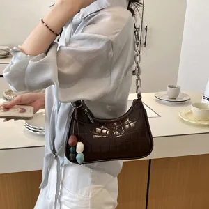 Stylish brown crocodile pattern underarm shoulder bag with chunky metal chain and chic charm