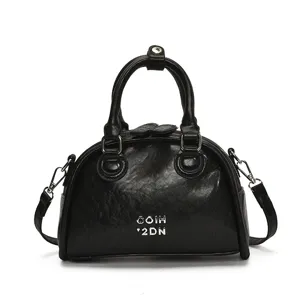 Zwarte vintage bowling handtas voor dames, casual PU leer schouder crossbody tas.
