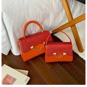 Korean niche design small square bag detail, orange PU crossbody handbag with glitter flap.