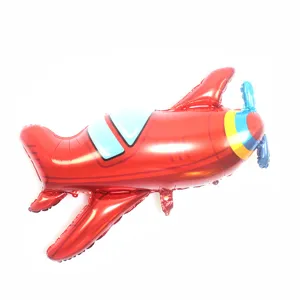 Vintage fighter plane foil balloon detail, red aircraft design with blue propeller for party.