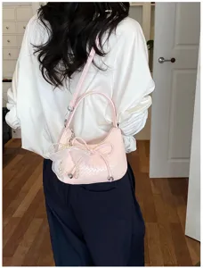 French woven crescent shoulder bag for women, stylish pink underarm crossbody bag with pearls.