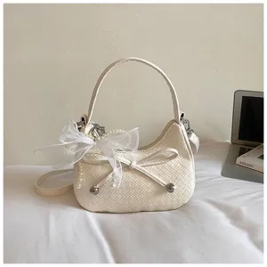 French woven crescent bag detail, chic solid color underarm shoulder crossbody bag with bow.