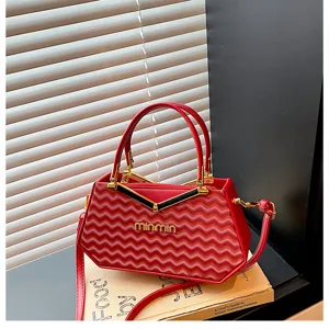 Borsa a mano rossa con motivo ondulato elegante borsa a tracolla di design di nicchia per donne