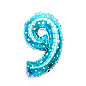 Detail view of blue star print number 9 foil balloon for birthday party decorations