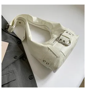 White PU leather motorcycle shoulder bag detail, showcasing metallic buckle and stylish strap.