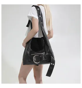 Black leather motorcycle shoulder bag with large metal buckle and spacious tote design.