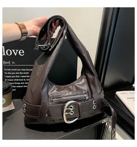 Vintage brown leather hobo shoulder bag with large metal buckle detail for women daily commute.