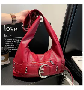 Red leather hobo shoulder bag with large metal buckle detail, stylish Y2K motorcycle purse.