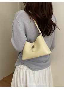 Borsa a tracolla minimalista, borsa da spalla alla moda per donna con chiusura metallica.