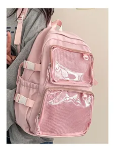Pink Japanese style ita backpack with clear mesh pockets for cute pins and daily school use