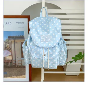 Light blue polka dot backpack with drawstring flap closure and front pocket for daily casual use
