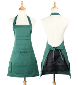 Green bib apron with multiple pockets, perfect for kitchen, cafe, and restaurant staff.