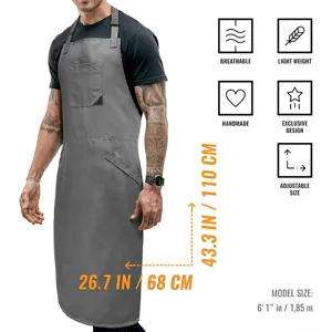 Delantal de trabajo gris largo y cómodo con correas ajustables ideal para cocina y taller.