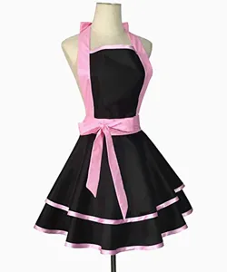 Black and pink vintage ruffled apron detail view, showcasing double-layered skirt and bow.