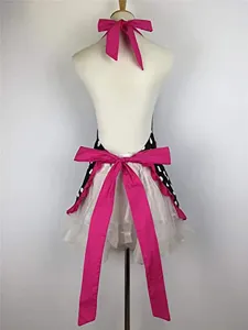 Retro polka dot apron detail view, showcasing the pink bow and white layered mesh ruffle hem.
