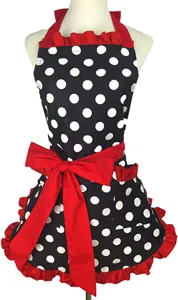 Vintage polka dot apron with red ruffles and bow, cute kitchen and cooking workwear.