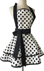 Vintage black and white polka dot apron detail, halter neck design with bow and ruffles.