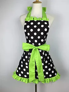 Vintage black and white polka dot apron with green ruffles, halter neck and cute bow.