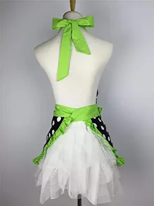 Retro black and white polka dot apron with bright green bow and ruffles for women.