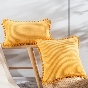 Corduroy stripe throw pillow cover with cute pom-pom trim for living room sofa bedroom decor.