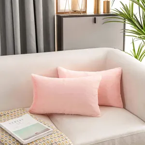Pink faux rabbit fur throw pillow soft plush cushion for sofa living room and bed decor.