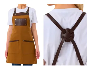 Brown canvas work apron with leatherette straps and multiple pockets, ideal for cafe cooking BBQ.