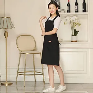 Professional black cotton polyester work apron with cross back straps for kitchen cafe use