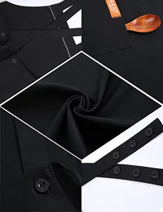 Close-up detail of black cotton-poly apron showing adjustable buttons, cross straps, pocket.