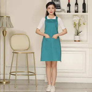 Cross-back cotton blend work apron with functional pockets for kitchen, cafe and daily use.