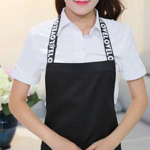 Korean style fashion kitchen apron with letter straps, ideal for coffee shop and home cooking.