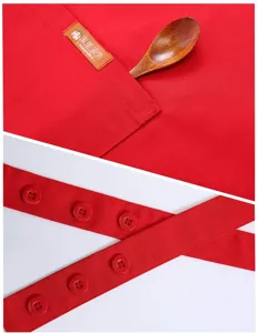Premium red polyester-cotton apron detail shot, showcasing durable fabric and adjustable buttons.