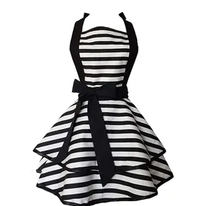 Vintage black and white striped halter apron with double layered skirt and waist bow.