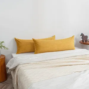 Comfortable corduroy long body pillow in yellow, ideal for bedroom sleep and relaxing support.