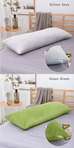 Vue détaillée du long oreiller de lit avec fermeture éclair lisse dans une chambre confortable.