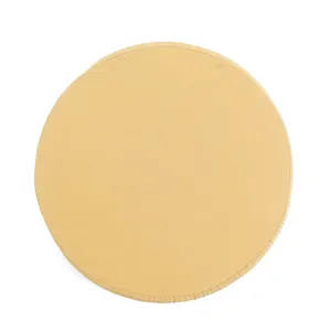 Round cotton canvas seat cushion detail view, comfortable sponge padding for office chairs.